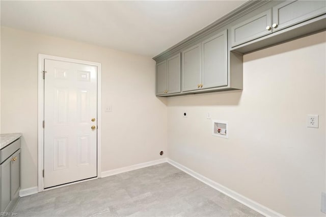 laundry area featuring hookup for a washing machine, cabinets, and hookup for an electric dryer