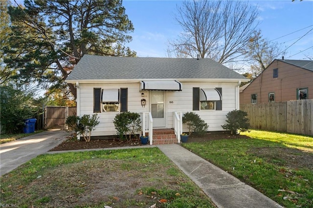 view of front of home with a front yard