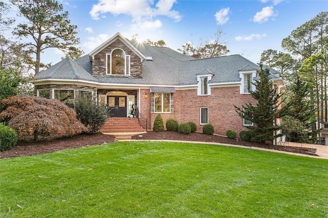 view of front facade with a front lawn