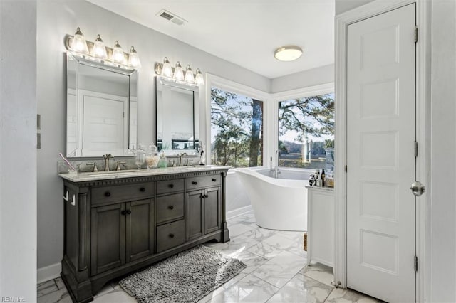 bathroom featuring a bathtub and vanity