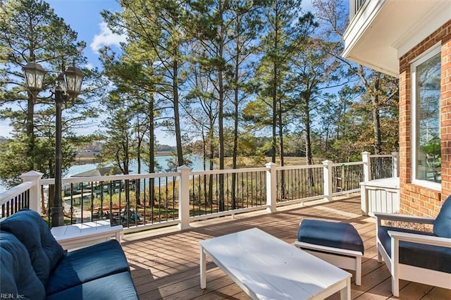 deck featuring a water view