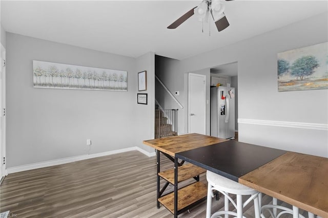 interior space with ceiling fan and hardwood / wood-style flooring