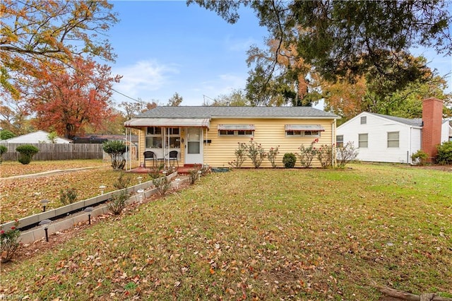 view of front of property with a front yard