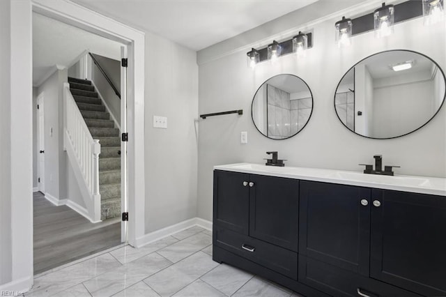 bathroom featuring hardwood / wood-style floors and vanity