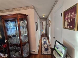 corridor featuring dark hardwood / wood-style flooring