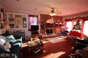 living room featuring ceiling fan