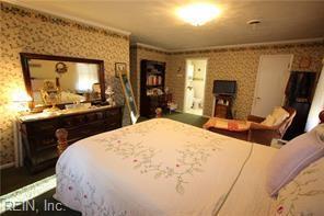 bedroom featuring ornamental molding