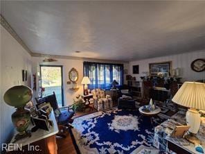 living room featuring ornamental molding and hardwood / wood-style flooring