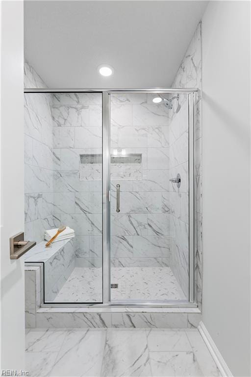 bathroom with an enclosed shower