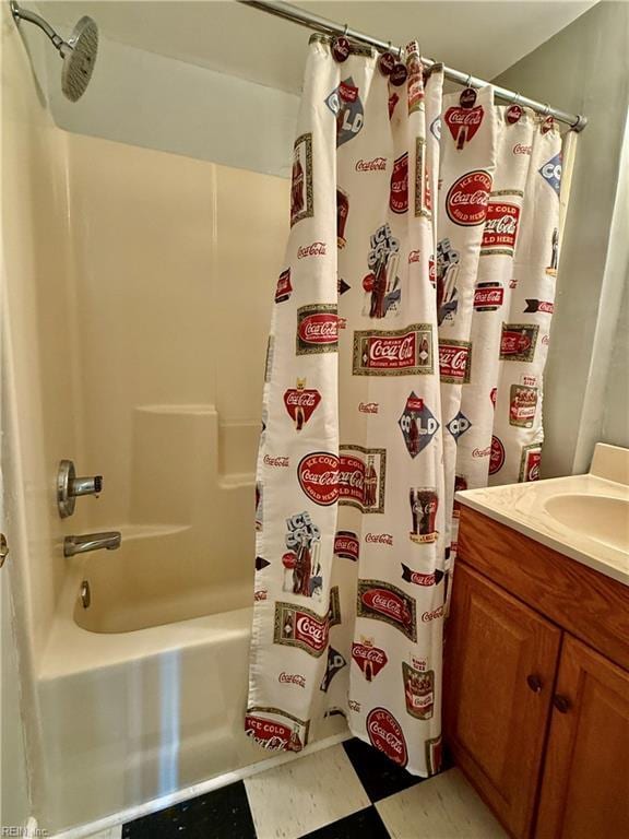 bathroom featuring vanity and shower / bathtub combination with curtain