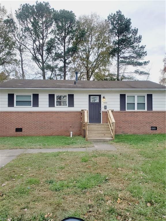 ranch-style home with a front lawn