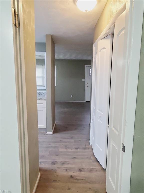 corridor featuring light wood-type flooring