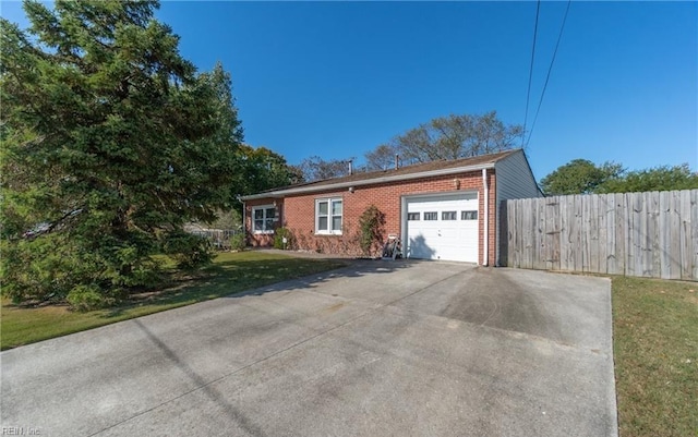 view of property exterior with a yard and a garage