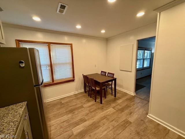 dining room featuring hardwood / wood-style flooring