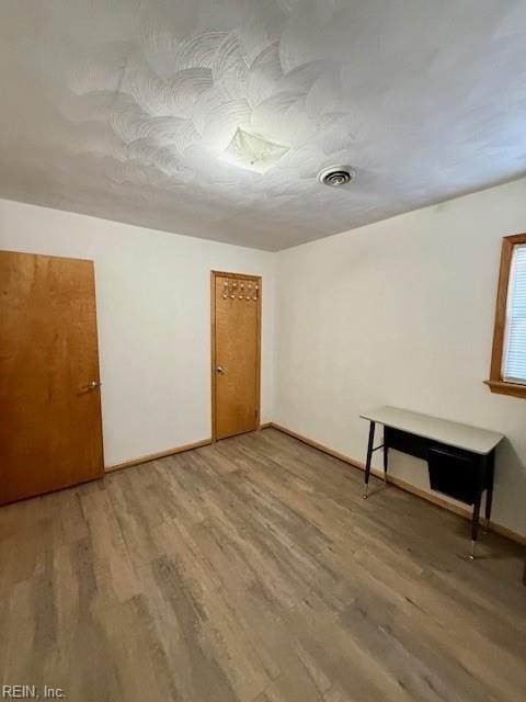 interior space featuring wood-type flooring