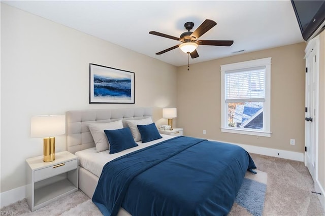 carpeted bedroom featuring ceiling fan