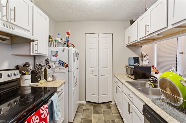 kitchen featuring white cabinetry, sink, a textured ceiling, and appliances with stainless steel finishes