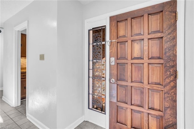 view of tiled foyer entrance