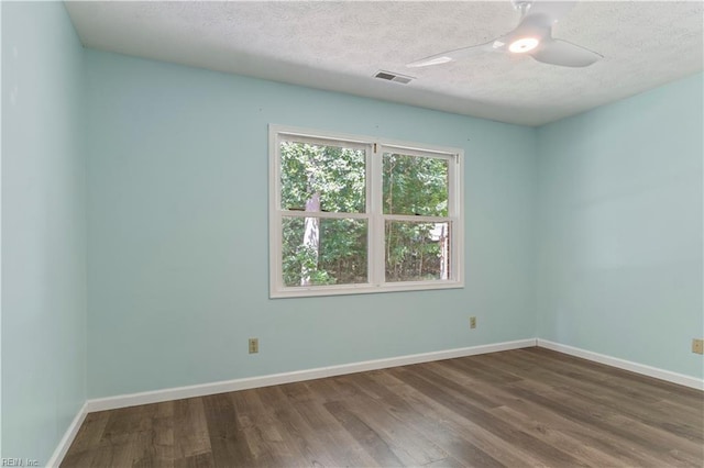 unfurnished room featuring wood-type flooring, a textured ceiling, and ceiling fan