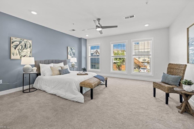 carpeted bedroom with ceiling fan