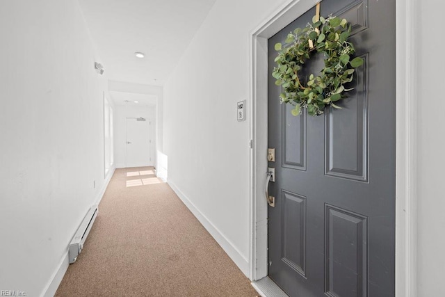 interior space with carpet flooring and baseboard heating