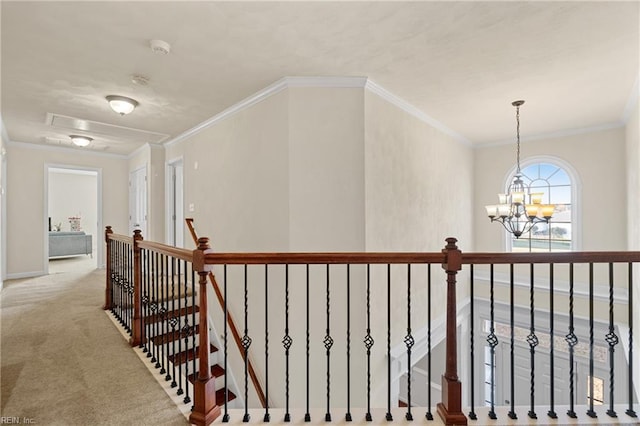 corridor featuring carpet, a chandelier, and ornamental molding