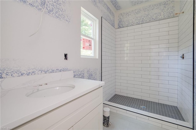 full bath featuring a shower stall and vanity