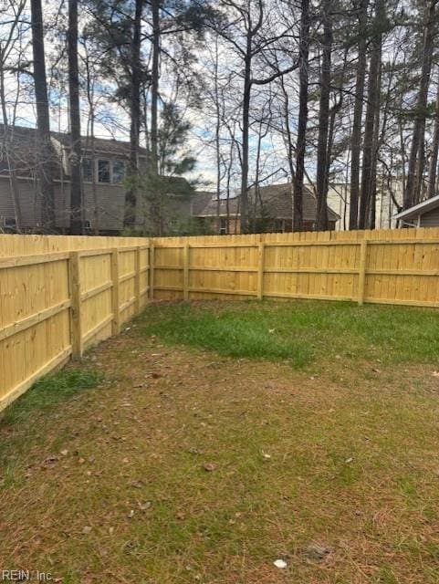 view of yard featuring a fenced backyard