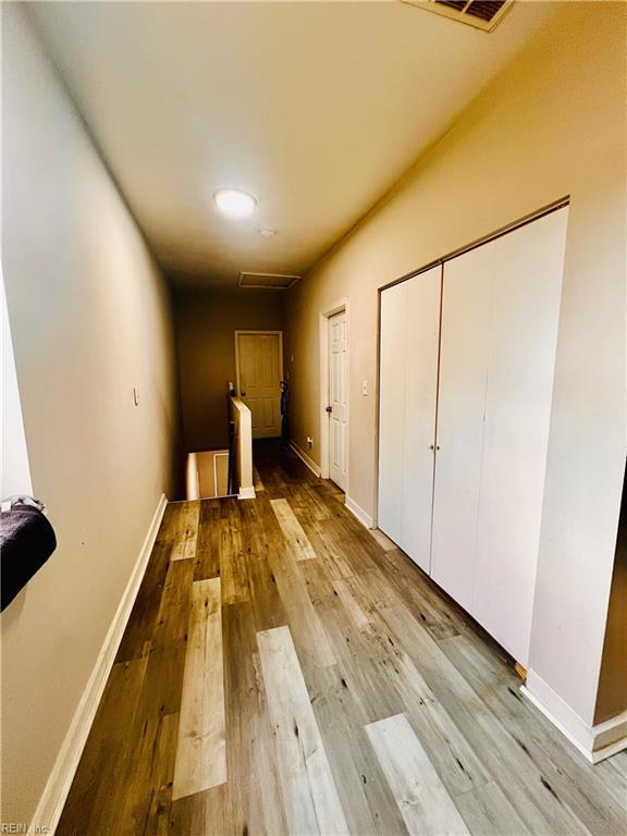 hallway featuring light hardwood / wood-style floors