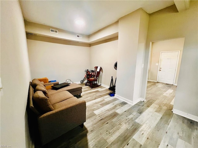 living area with hardwood / wood-style floors