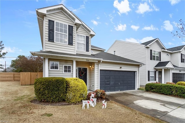 front of property with a garage