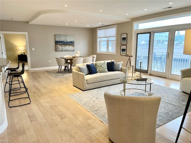 living room featuring light wood-type flooring