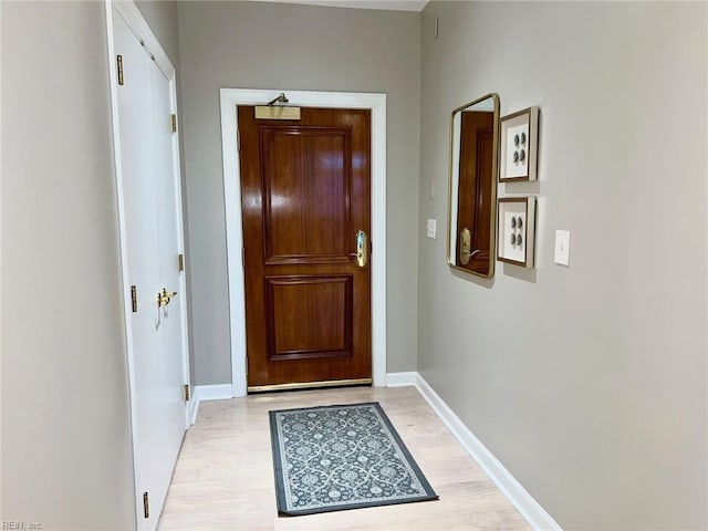 doorway to outside with light hardwood / wood-style floors