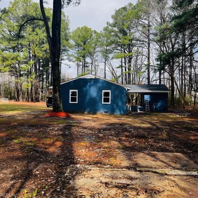 view of property exterior featuring cooling unit