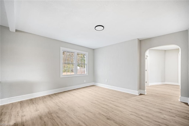 spare room featuring light hardwood / wood-style floors