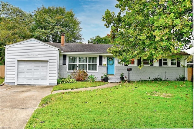 ranch-style home with a front yard and a garage