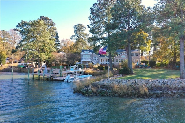 property view of water with a dock