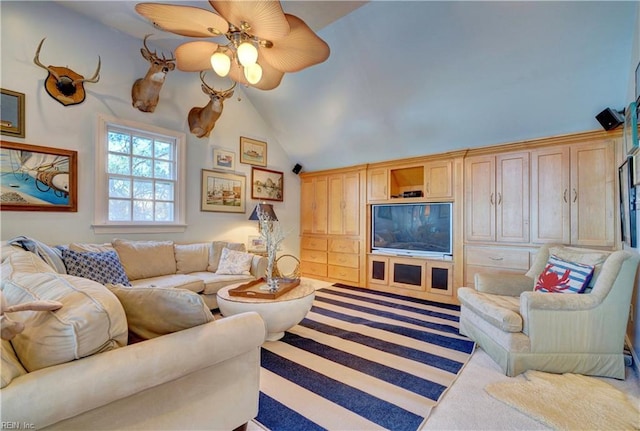 living room featuring carpet flooring, ceiling fan, and vaulted ceiling