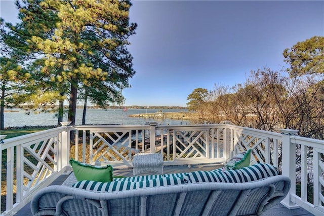 deck featuring a water view