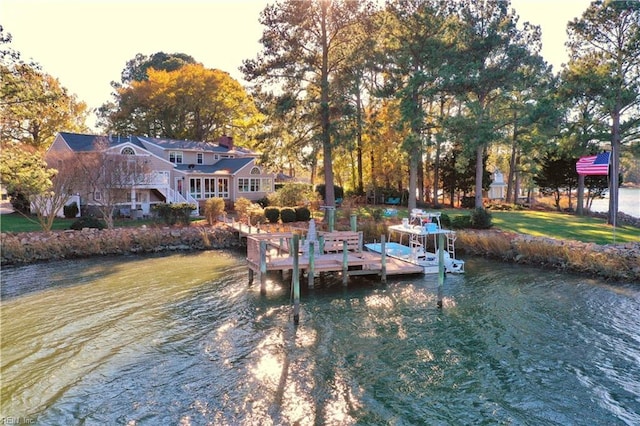 dock area with a water view