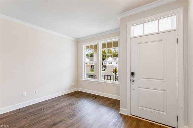 foyer featuring dark wood-type flooring and ornamental molding