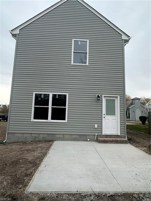 back of house featuring a patio