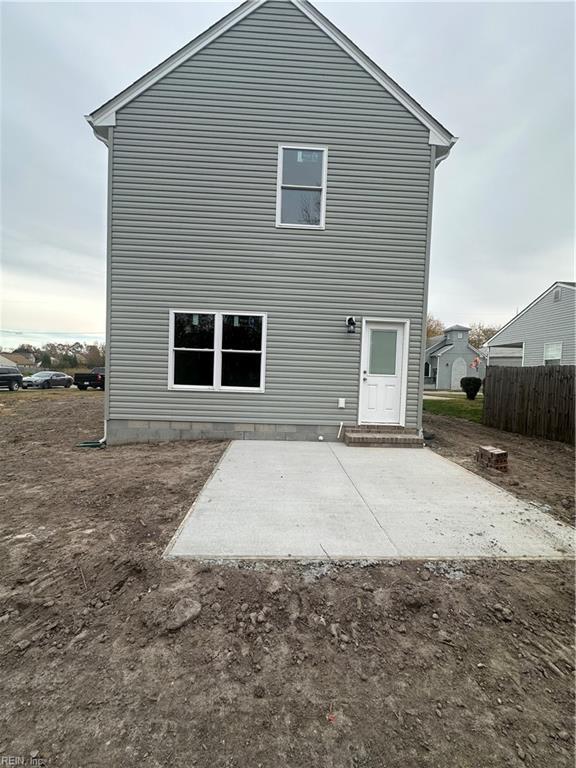 rear view of house featuring a patio