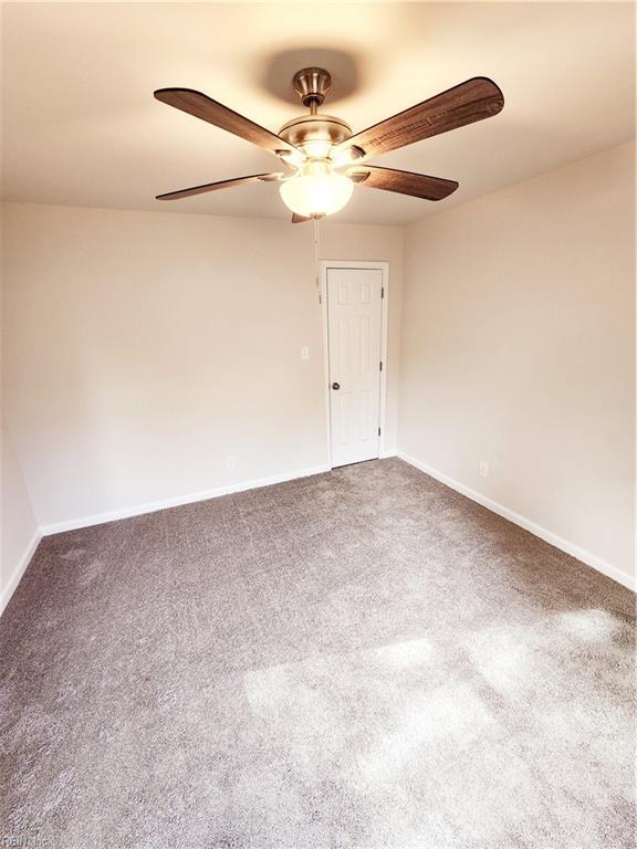 spare room featuring ceiling fan