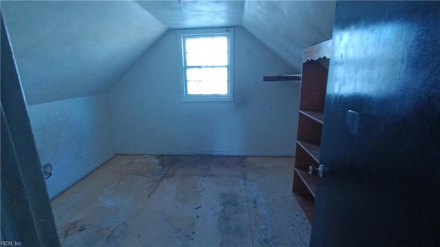 bonus room featuring lofted ceiling