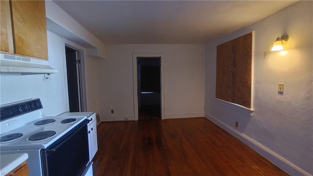 kitchen featuring white range with electric stovetop and dark hardwood / wood-style flooring