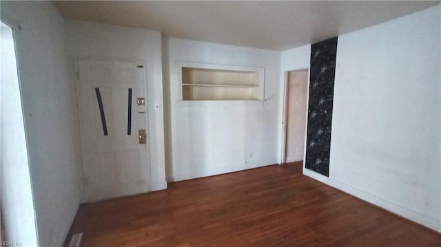 interior space featuring dark wood-type flooring