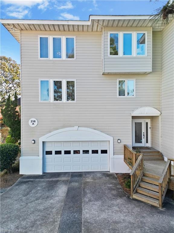 view of front of property with a garage