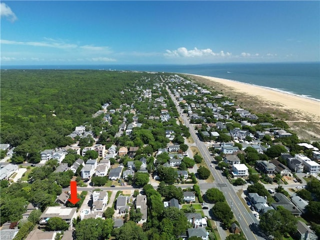 aerial view featuring a view of the beach and a water view