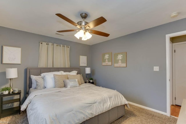 carpeted bedroom featuring ceiling fan